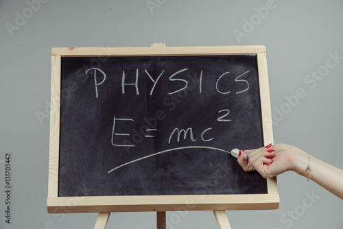 Tapety artystyczne Physics word and formula E=mc2 on chalkboard