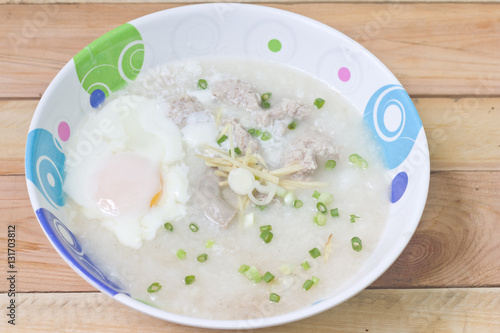 Traditional chinese porridge rice gruel in bowl.