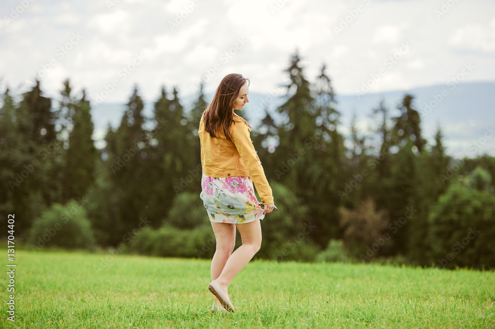 Beautiful Young Woman Outdoors. Enjoy Nature.