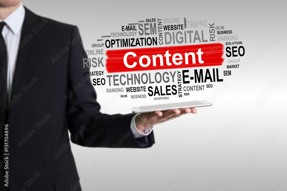 Content concept. Man holding a tablet computer Content concept. Man holding a tablet computer
