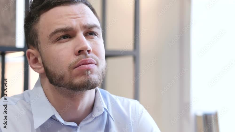 Upset Young Man at Work Upset Young Man at Work