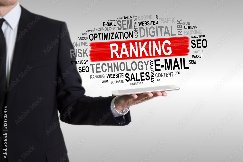 Ranking concept. Man holding a tablet computer