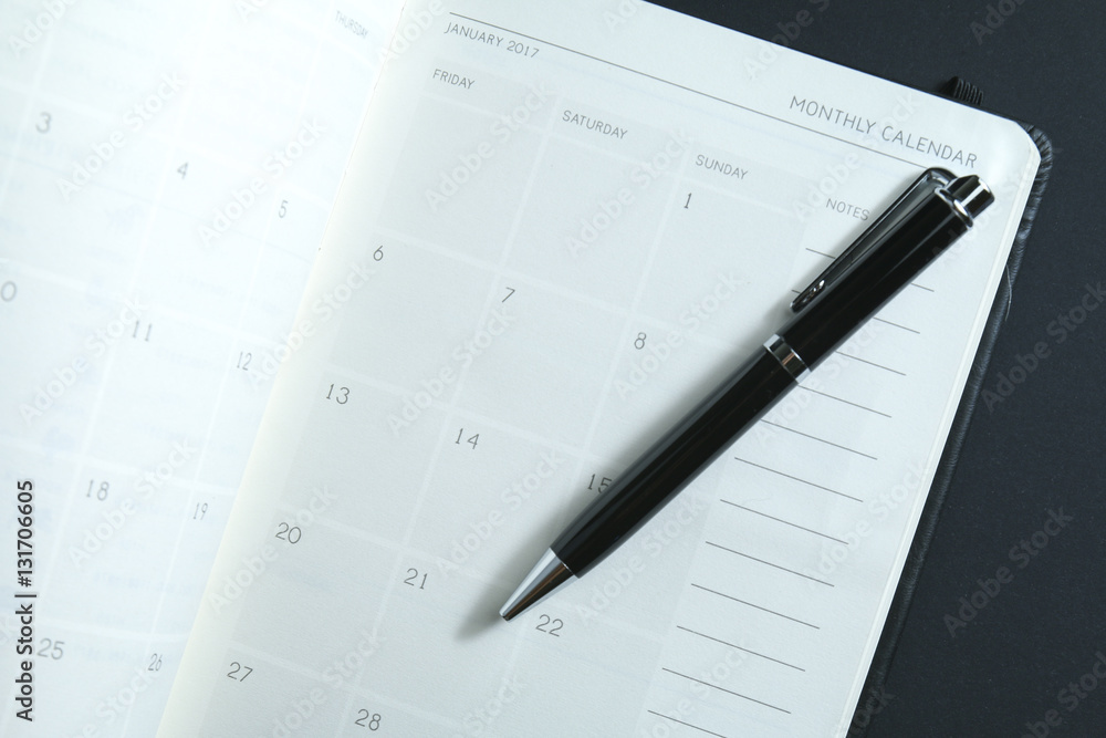 First page of calendar on planner for year 2017 with focus on January 1st. First page of calendar on planner for year 2017 with focus on January 1st.