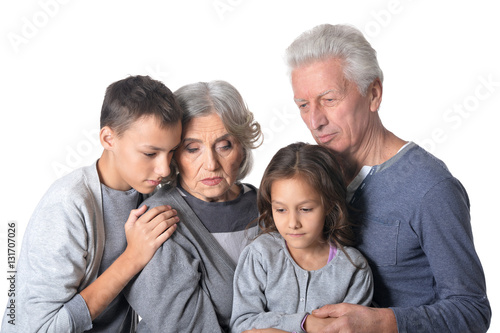Pensive grandparents with kids © aletia2011