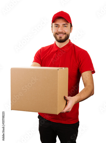 delivery service - young smiling courier holding cardboard box