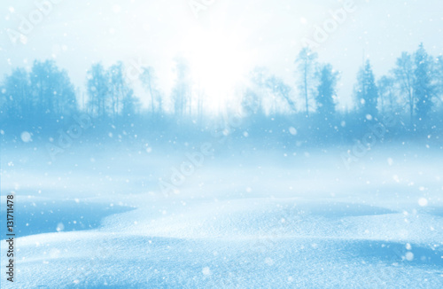 Winter snowy landscape with snowdrifts and snowstorm