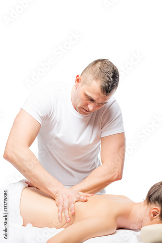 portrait of a professional masseuse at work in isolation
