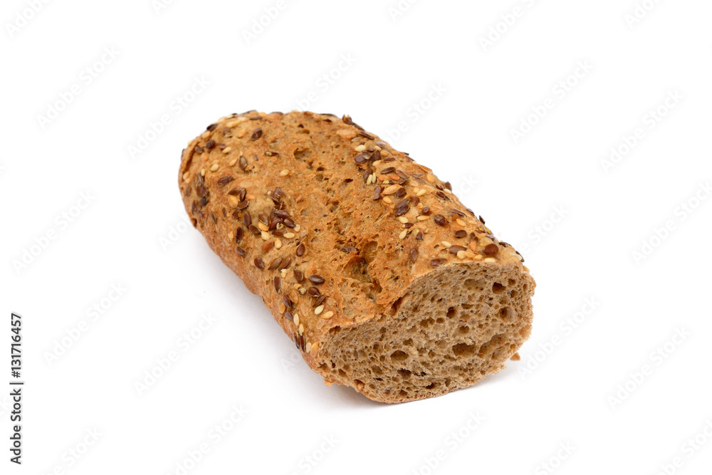 Sliced wholemeal baguette isolated on white background Sliced wholemeal baguette isolated on white background