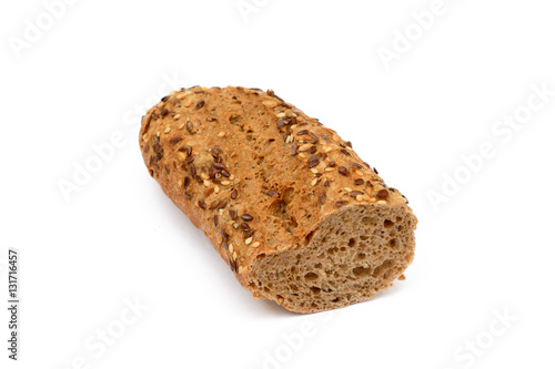 Sliced wholemeal baguette isolated on white background