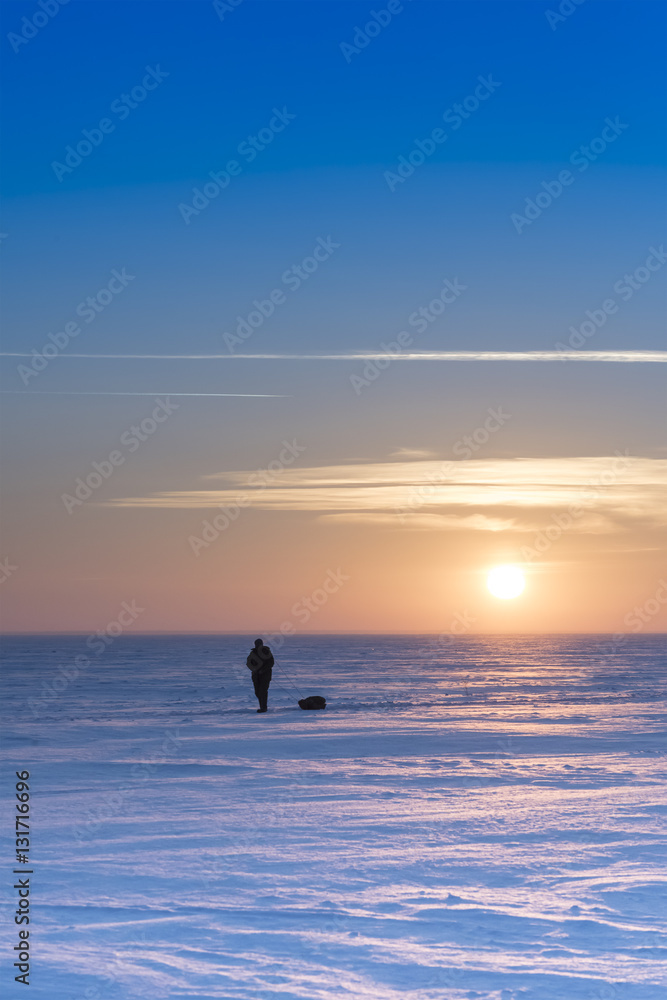 Fototapeta premium Winter landscape with the setting sun
