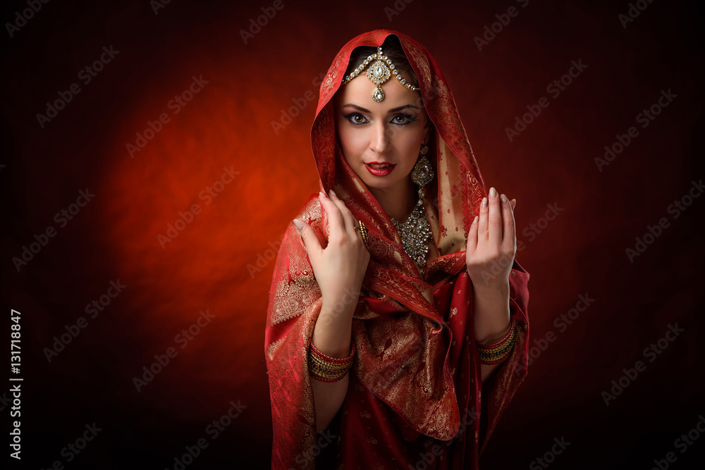 Portrait of beautiful indian girl . Young hindu woman model kundan jewelry . Traditional costume Portrait of beautiful indian girl . Young hindu woman model kundan jewelry . Traditional costume