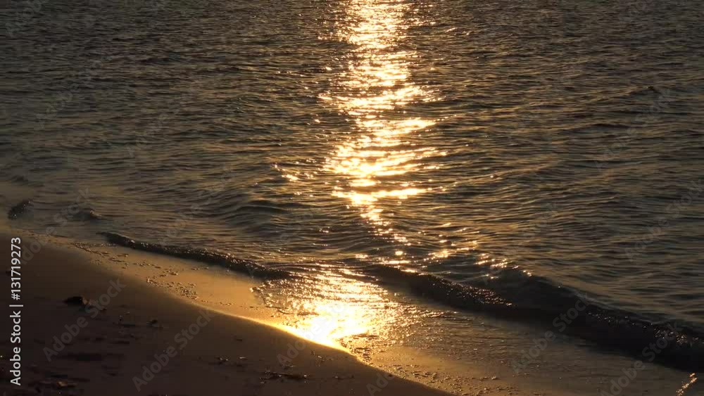 Amber sea sunset with a solar glitter path on waves. Caribbean, Cuba. Amber sea sunset with a solar glitter path on waves. Caribbean, Cuba.