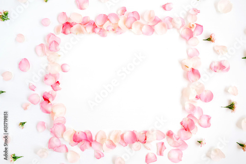 Fototapeta Naklejka Na Ścianę i Meble -  Frame made of pink roses petals on white background. Flat lay, top view. Valentine's background