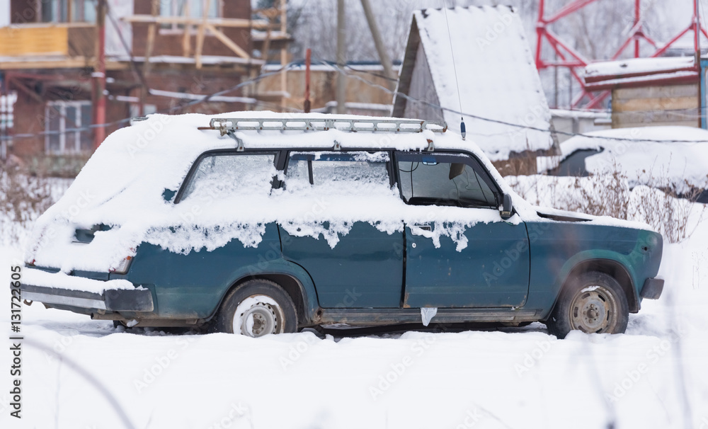 old car covered with snow old car covered with snow