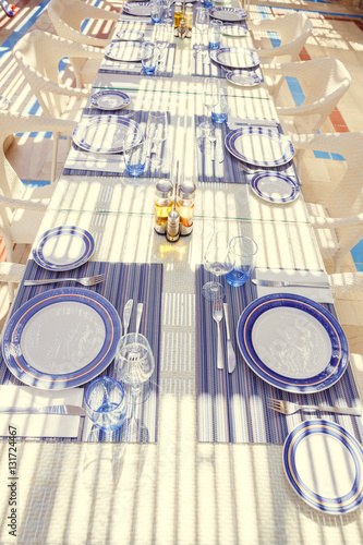 restaurant table setting, with bright colors and Mediterranean-s © Aleksey Sergeychik