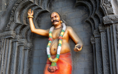 Indian Burrakatha teller or haridasu Wall art on the pillar of a Flyover ,Hyderabad,India