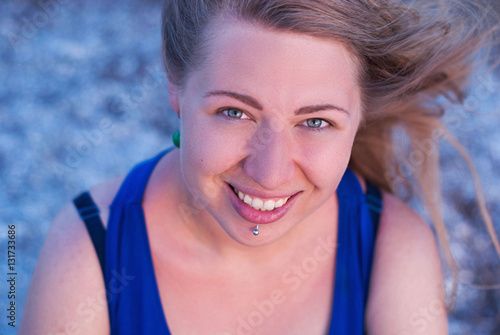 Laughing girl with piercings