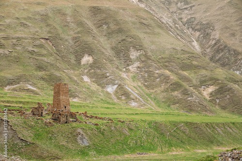 Ancient Old Stone Watchtower On Mountain Background In Chetoyta  photo