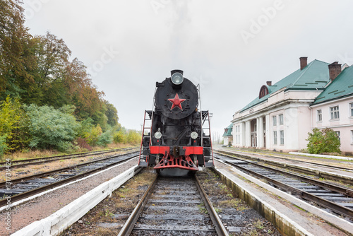Rare steam train locomotive at the small railway station, Carpathians, Ukraine