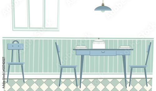 Vintage kitchen table. Front view of a dining area inside a retro style kitchen. © javieruiz