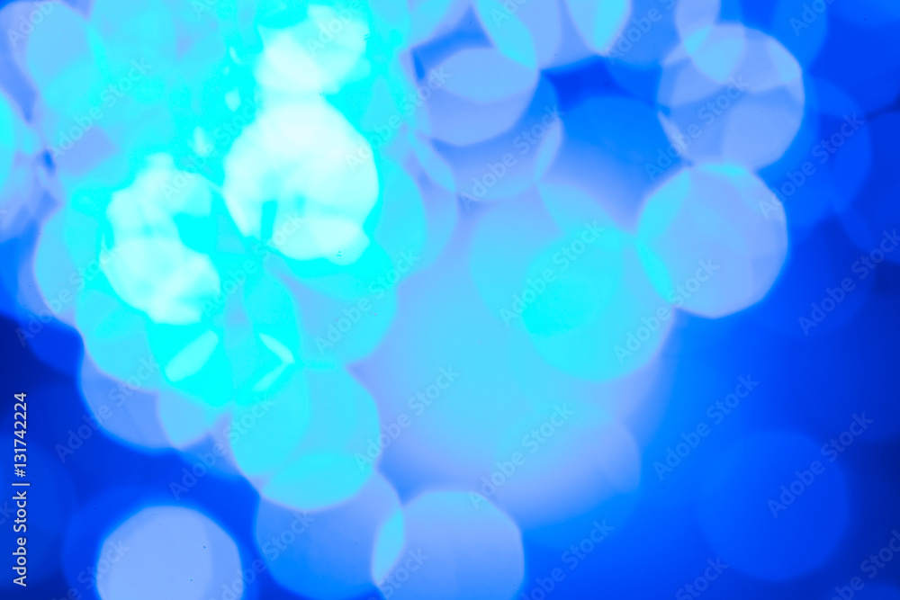 Defocused blue lights bokeh background Defocused blue lights bokeh background