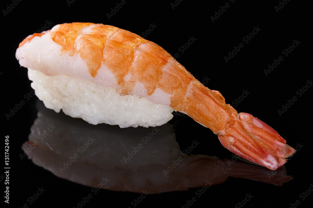 Sushi nigiri with shrimp on black background with reflection. Japanese cuisine Sushi nigiri with shrimp on black background with reflection. Japanese cuisine