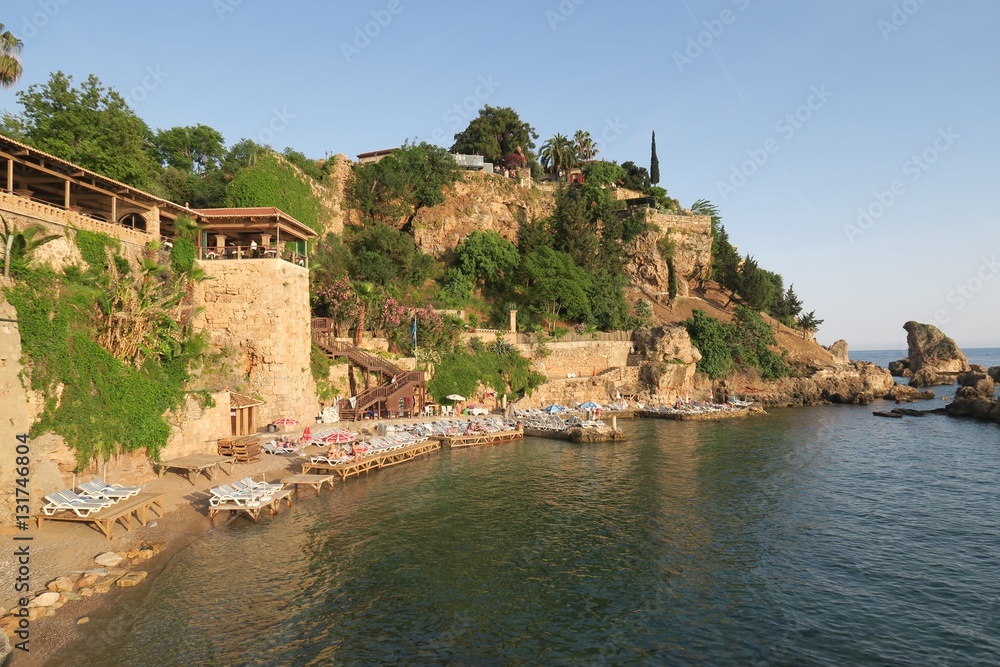 Mermerli Beach and Restaurant with the City Walls in Antalyas Oldtown Kaleici, Turkey