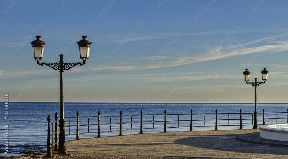 empty quay with lanterns.and Sea View