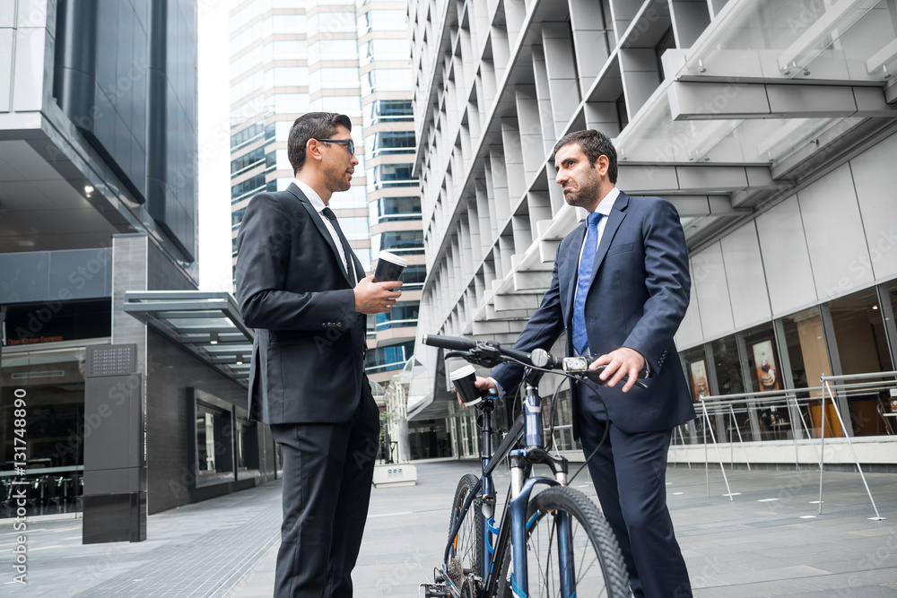 Two businessmen having walk Two businessmen having walk