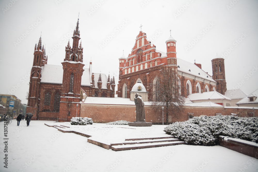 Obraz premium St Anne's and Bernadine's Churches in Vilnius (Lithuania) beautiful architecture of Baltic States in winter during Christmas holidays weekend travel with friends