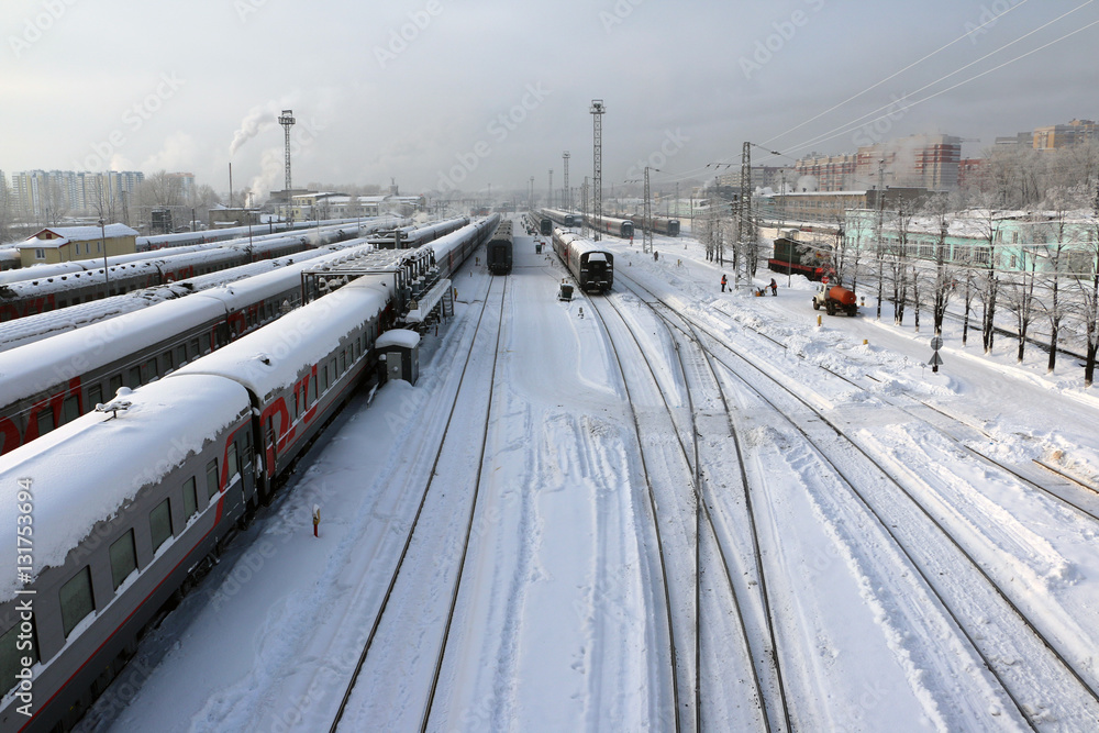 Naklejka premium Railway in a winter day and snow around