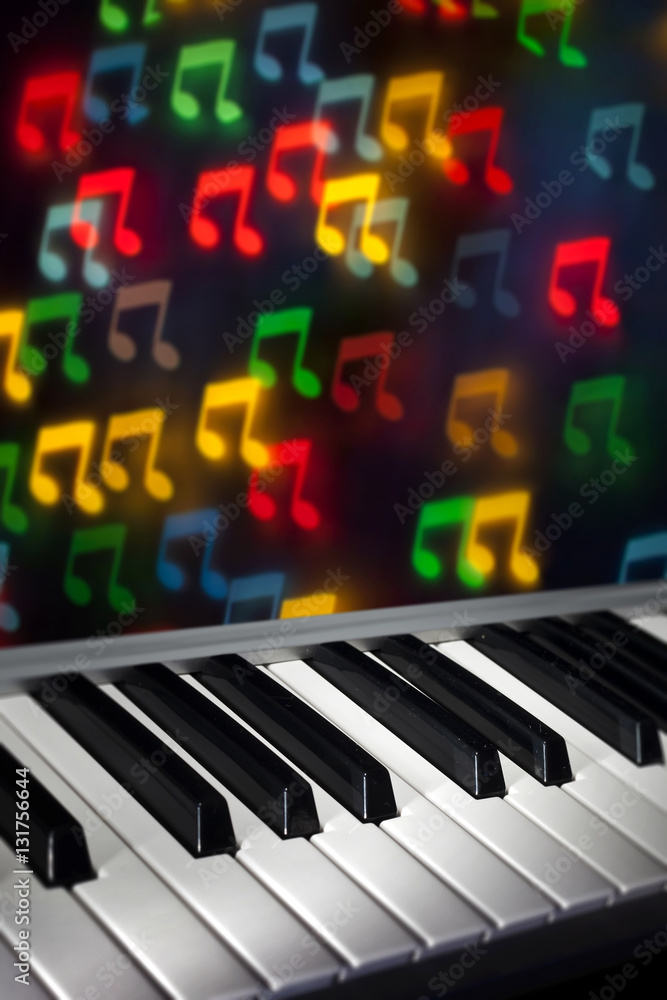 Fototapeta premium Piano Keyboard with Bokeh Notes
