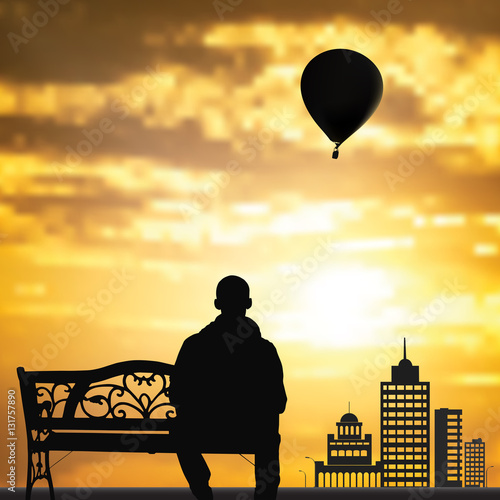 Men in the on a bench to enjoy the sunset