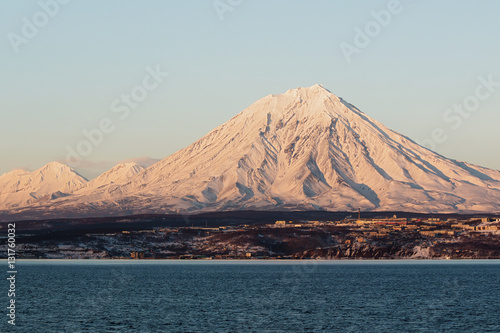Snow volcano over Petropavlovsk-Kamchatskiy at dawn
