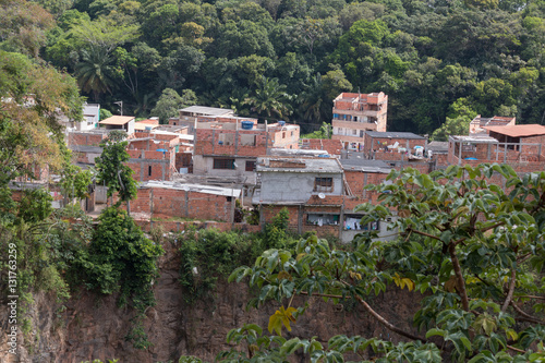 Favela invading the vegetation area inside the city