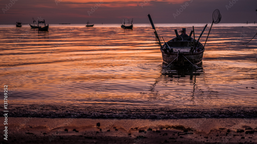 Beautiful sunset with fishing boat, vintage tone - obrazy, fototapety, plakaty 