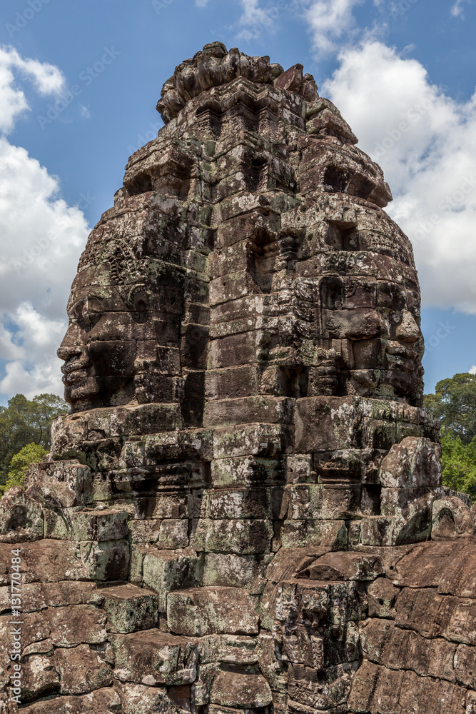 Bayon stone face tower in Angkor Wat, Siem Reap, Cambodia.
