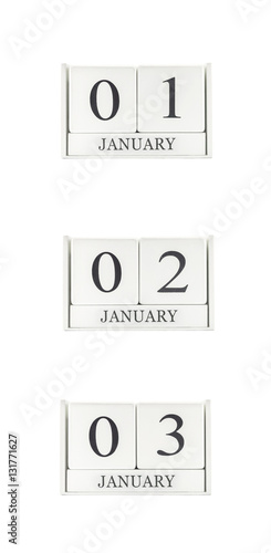 Closeup group of white wooden calendar with black 1 , 2 , 3 january word , three date calendar isolated on white background