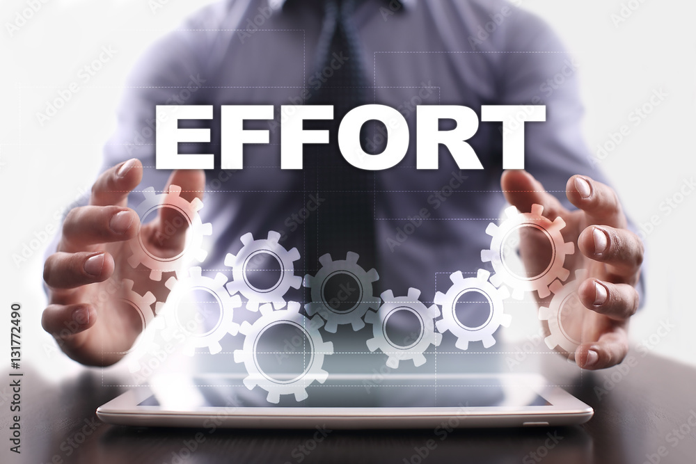 Naklejka premium Businessman is using tablet pc and selecting effort.