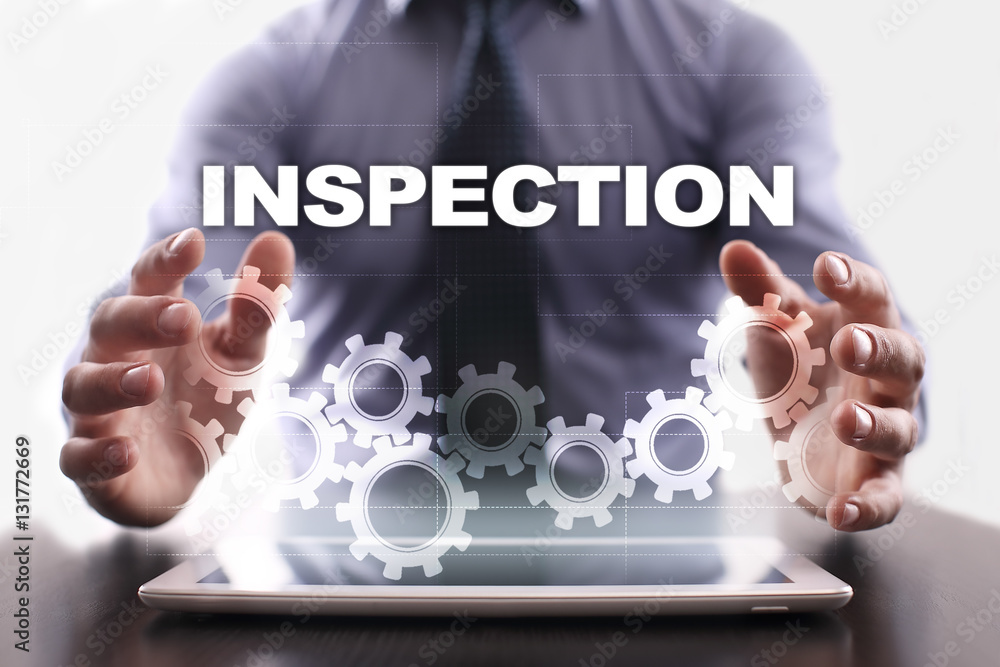 Fototapeta premium Businessman is using tablet pc and selecting inspection.