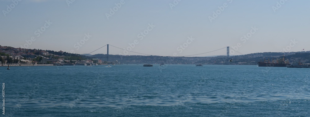 Famous Bosphorus Bridge and Strait with Ships, as seen from the European Side of Istanbul, in Turkey