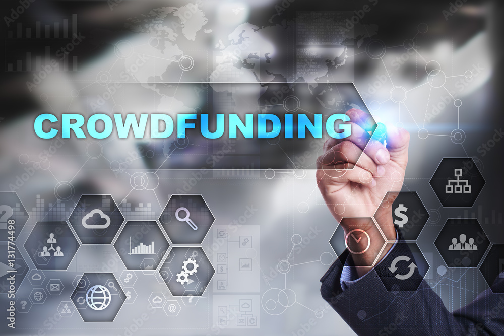 Businessman is drawing on virtual screen. crowdfunding concept. Businessman is drawing on virtual screen. crowdfunding concept.