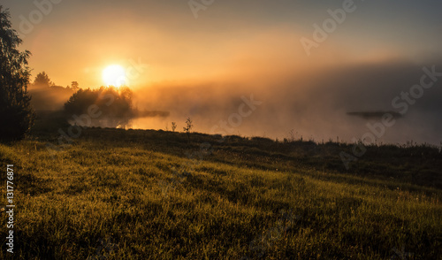 Panorama rays of the rising sun.