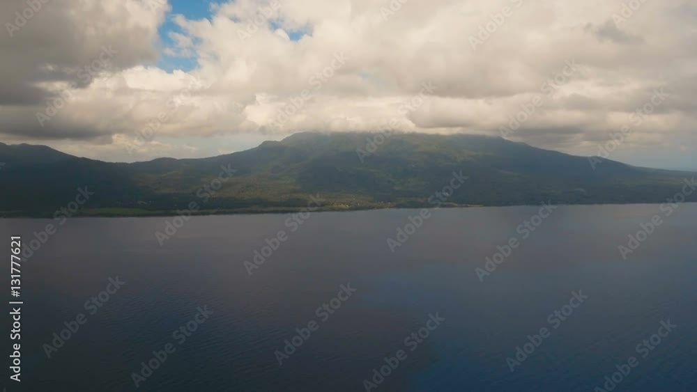 Aerial view coastline on tropical island with sea, trees and palms. Aerial footage.Aerial video from flying drone of amazingly beautiful landscape of nature with mountains,hills, rain forest. Seascape Aerial view coastline on tropical island with sea, trees and palms. Aerial footage.Aerial video from flying drone of amazingly beautiful landscape of nature with mountains,hills, rain forest. Seascape