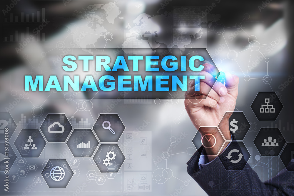 Businessman is drawing on virtual screen. strategic management concept. Businessman is drawing on virtual screen. strategic management concept.