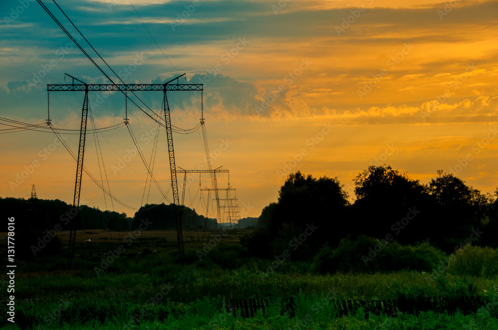 Obraz premium high-voltage line in the field