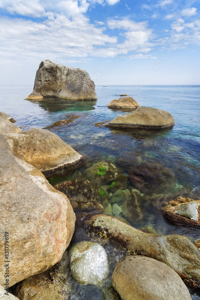 wild beach stone / Yalta day photo at the foot of the Vorontsov wild beach stone / Yalta day photo at the foot of the Vorontsov