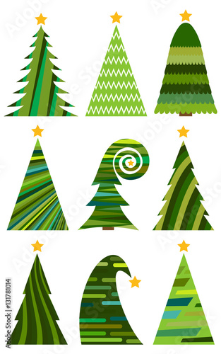 Christmas tree with multi-colored toys. Christmas tree in the village at night. Starry night sky in the village in winter.
