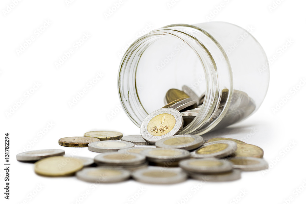 Egyptian Pounds, Coins in Jar, Isolated on White Background Egyptian Pounds, Coins in Jar, Isolated on White Background