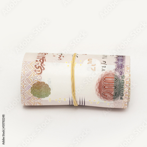 Roll of Egyptian Pounds, Isolated on White Background